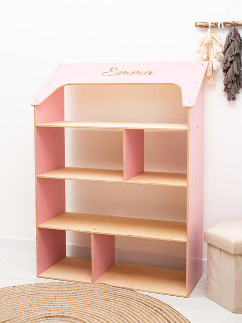 pink Montessori child-sized wooden doll house bookcase